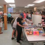 photo of a book sale at the Cook Memorial Library