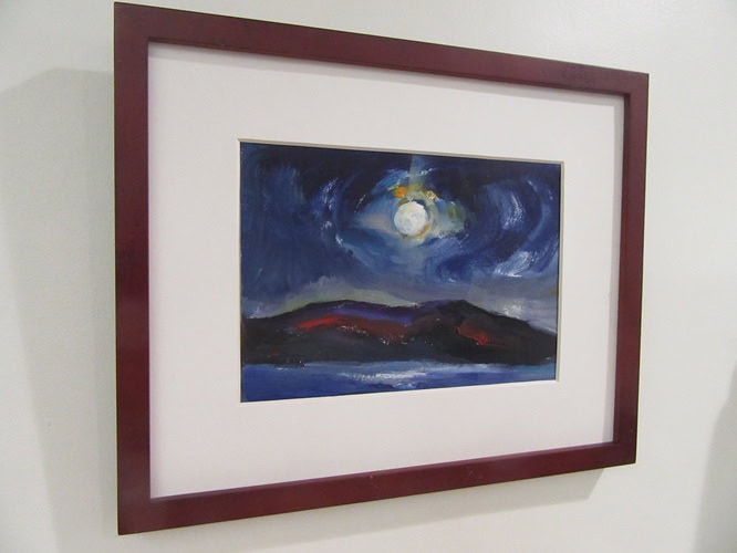 photo of a painting of mountains and a moonlit sky which is part of an art show at Cook Memorial Library in Jun e and July 2026