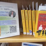 Display of copies of the book "Property of the Revolution."